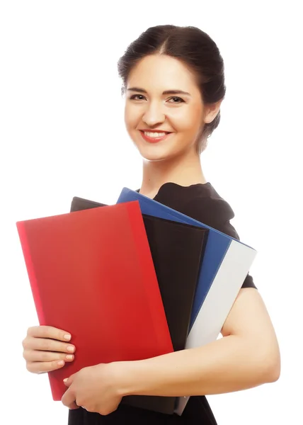 Retrato de mujer de negocios sonriente con carpetas — Foto de Stock