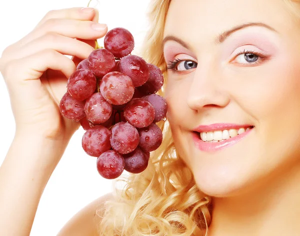 Young blond woman with grape — Stock Photo, Image