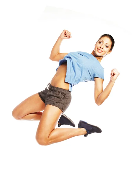 Fitness woman jumping of joy. — Stock Photo, Image