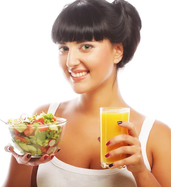 Woman has breakfast salad from vegetables — Stock Photo, Image