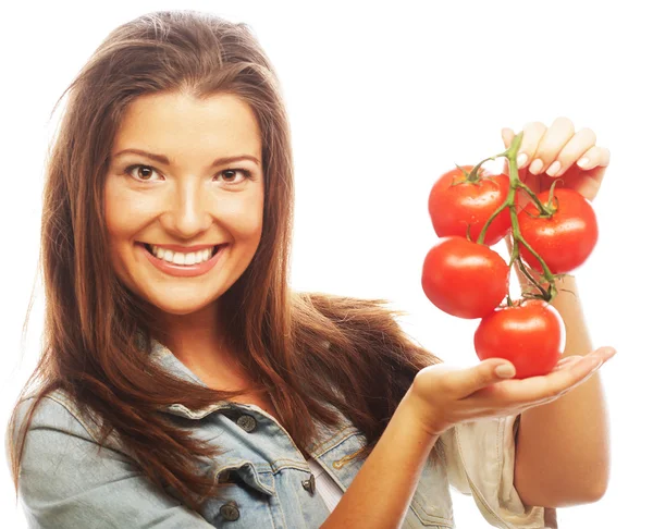 Mulher bonita com tomates maduros — Fotografia de Stock