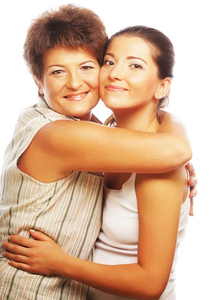 Filha abraçando sua mãe Imagem De Stock