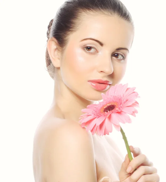 Piękna kobieta z różowym gerber — Zdjęcie stockowe