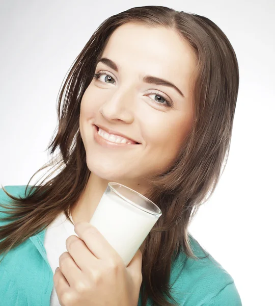 Young lady having a glass of milk Stock Picture