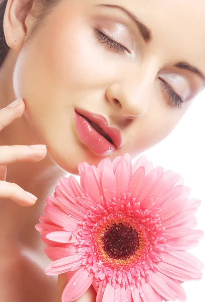 Beautiful woman with pink gerber — Stock Photo, Image