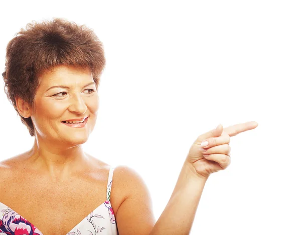 Mature Woman pointing — Stock Photo, Image