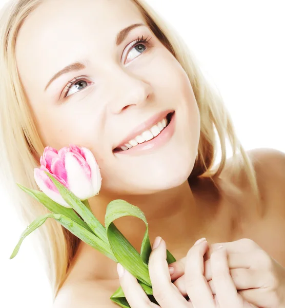 Blond meisje met tulp — Stockfoto