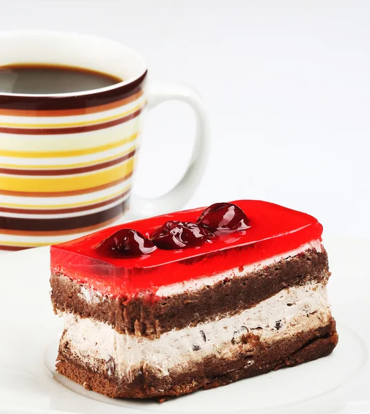 Kek ve bir fincan kahve. — Stok fotoğraf