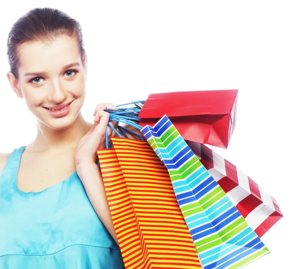Young woman carrying shopping bags — Stock Photo, Image