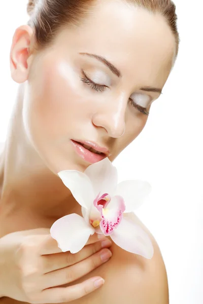 Woman with orchid flower — Stock Photo, Image
