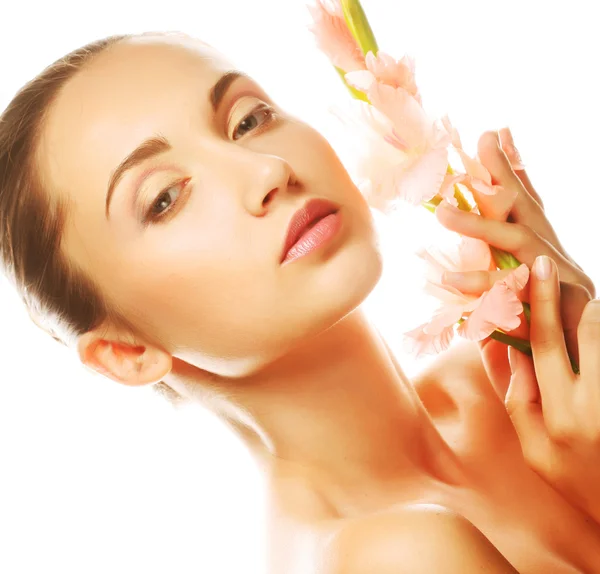 Fresh face with gladiolus flowers in her hands — Stock Photo, Image