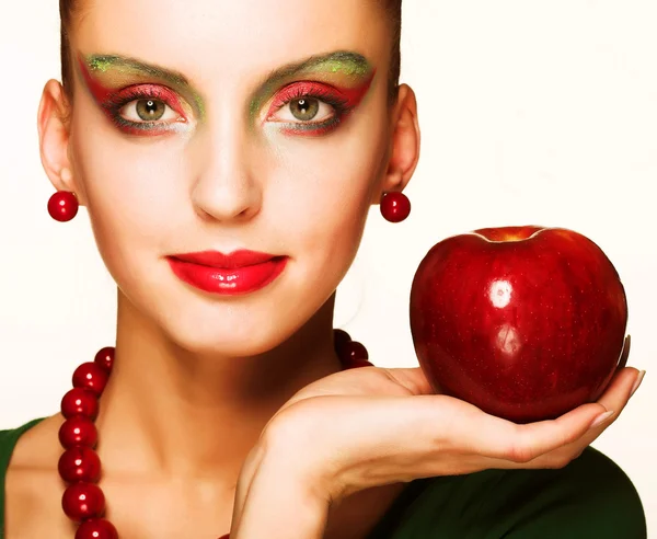 Woman with an apple — Stock Photo, Image