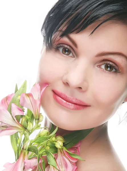 Frau mit rosa Blüten — Stockfoto