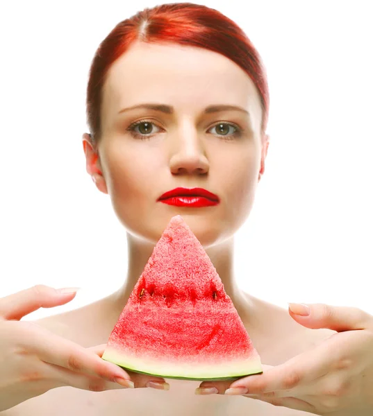 Kaunis nuori nainen vesimelonin kanssa — kuvapankkivalokuva