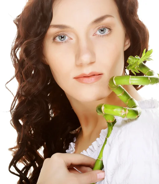 Young woman with bamboo. — Stock Photo, Image