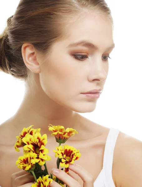 Woman with yellow chrysanthemum — Stock Photo, Image