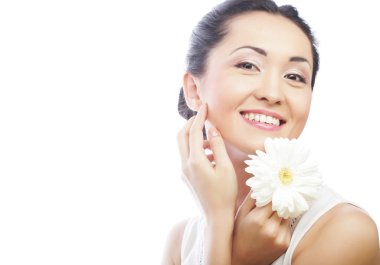 Beyaz Gerber 'li taze Asyalı kadın.