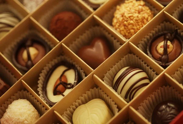 Chocolate candies in a box — Stock Photo, Image