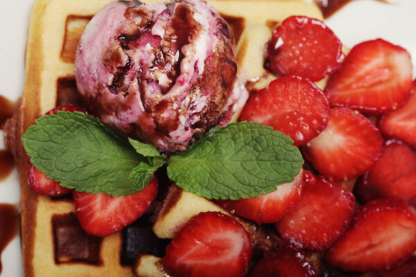 waffles with strawberry and ice cream