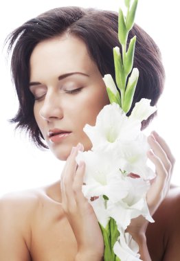 onun elinde Glayöl çiçek ile yeni bir yüz