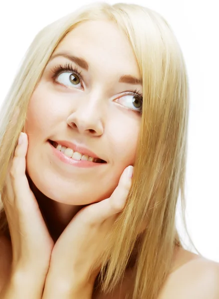 Smiling thinking woman looking up — Stockfoto