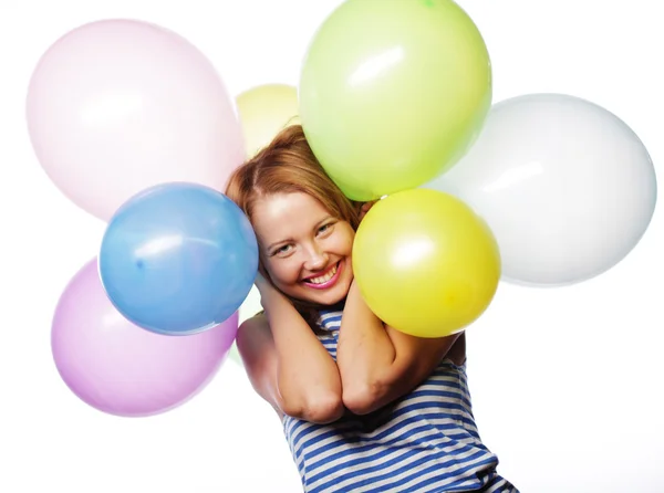 Щаслива дівчина з повітряними кулями — стокове фото