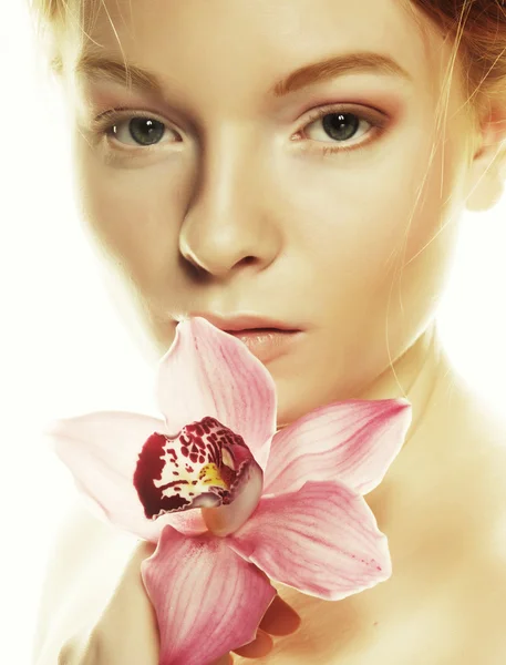 Beautiful woman with pink flower — Stock Photo, Image