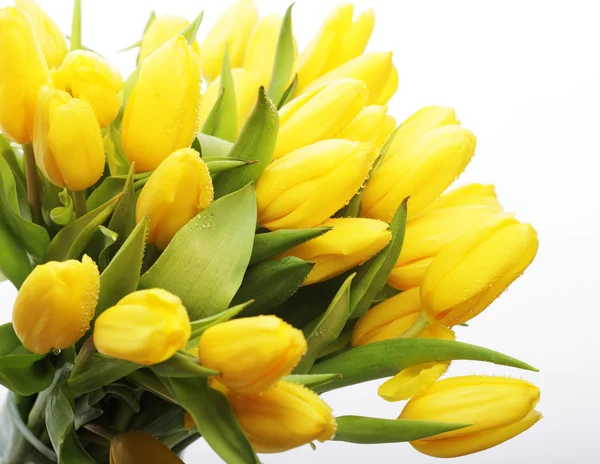 Tulipánová kytice ve skleněné váze — Stock fotografie