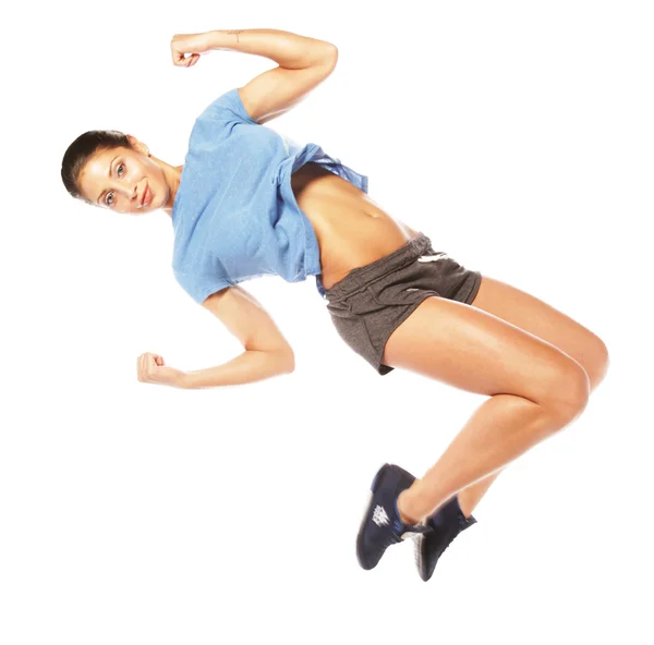 Fitness woman jumping of joy. — Stock Photo, Image