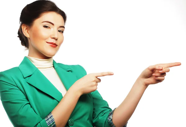 Mujer de negocios feliz señalando una idea — Foto de Stock