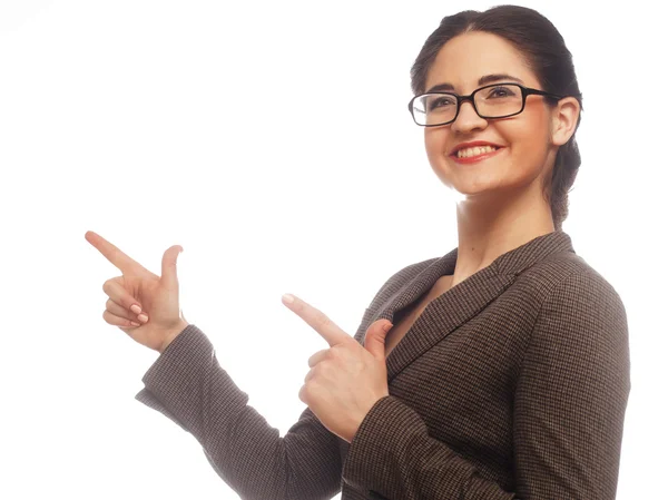 Business woman standing against white backgrou — Stock Photo, Image