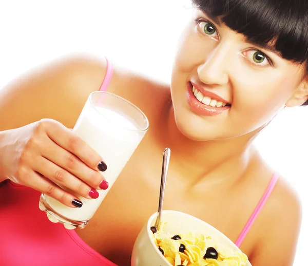 Young woman with muesli and milk — Stock Photo, Image