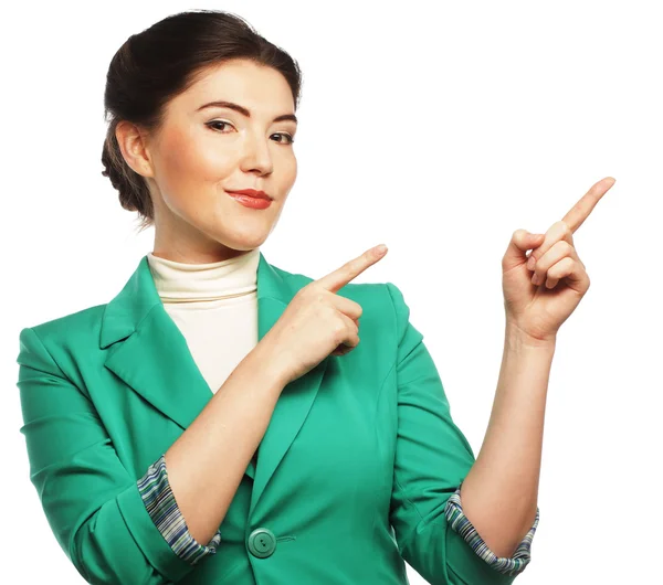 Happy business woman pointing an idea — Stock Photo, Image