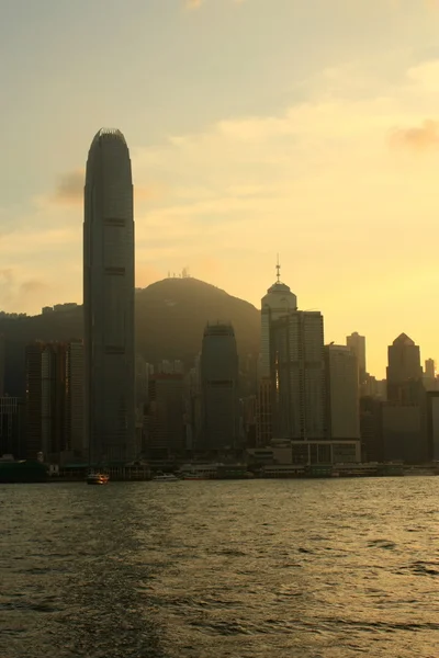 Zachód słońca w victoria harbor, hong kong. — Zdjęcie stockowe