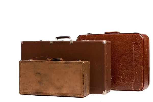 Винтажные выветриваемые кожаные чемоданы друг на друге — стоковое фото