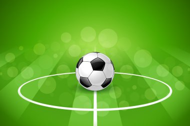 Yeşil zemin üzerinde futbol topu
