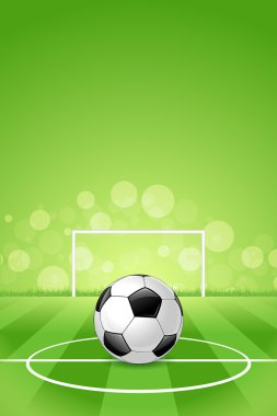 Yeşil zemin üzerinde futbol topu