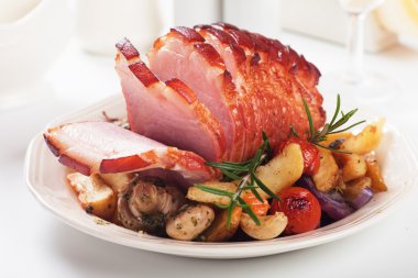 Roasted ham with vegetables clipart