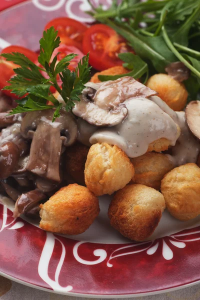 Roasted potato croquettes with portabello mushrooms — Stock Photo, Image