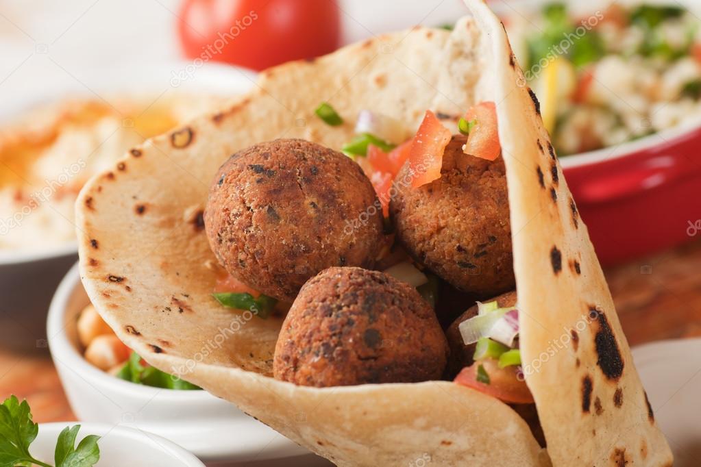 Falafel, deep fried chickpea balls on pita bread — Stock Photo