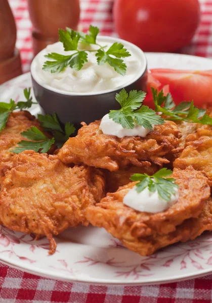 Latke, potato pancake with sour cream