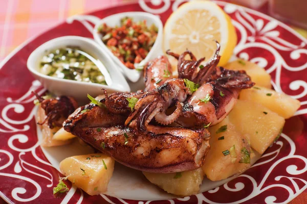 Fried squid with potato — Stock Photo, Image