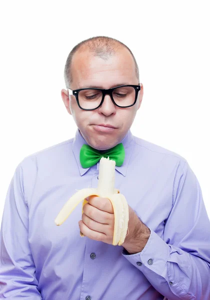 Člověk jíst banán — Stock fotografie