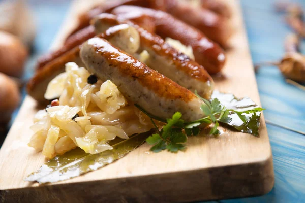 Grilled German Sausage Links Served Sauerkraut Sour Cabbage — Stock Photo, Image