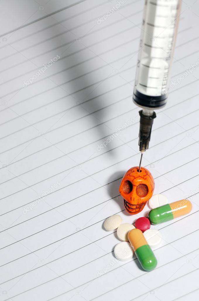 drugs syringe skull