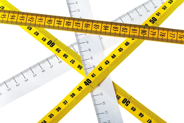 Tape measures cross on white background — Stock Photo, Image