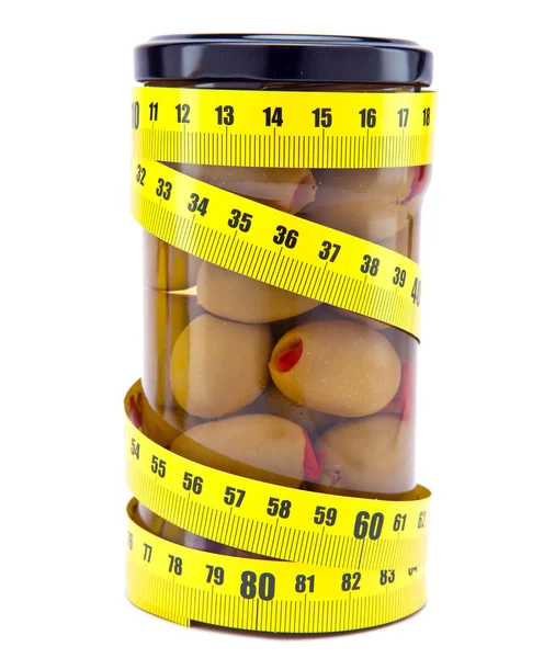 Olive and measuring tape- healthy food — Stock Photo, Image