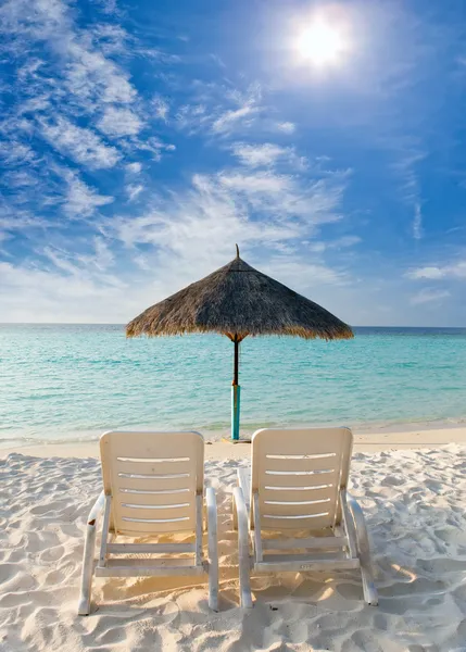 Two plank beds on the seashore — Stock Photo, Image