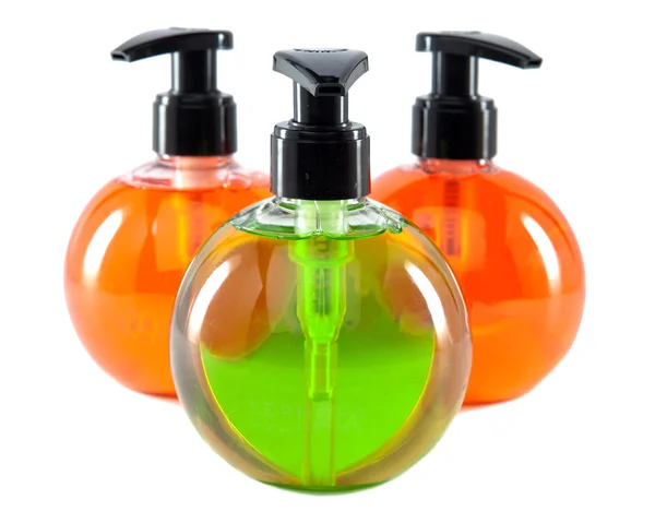 Яскраві кольорові косметичні маленькі пляшки з дозатором — стокове фото