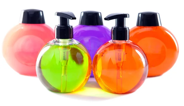 Яркий цвет косметические маленькие бутылочки с диспенсером — стоковое фото